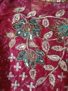 Maroon Sequinned Georgette Heavy Work Saree
