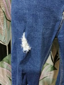 Ripped Dark Blue Jeans