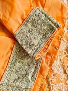 heavy peach embroidered saree