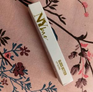 NY Bae Lip Gloss in brown dates shade