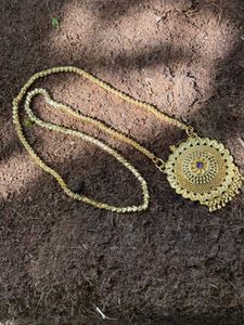Long Chain With Minimal Purple Stone Dollar
