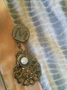 A Beautiful M Pendant Gown