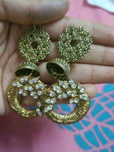 combo of golden jhumri and Studs earring
