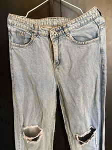 Blue Knee Ripped Jeans