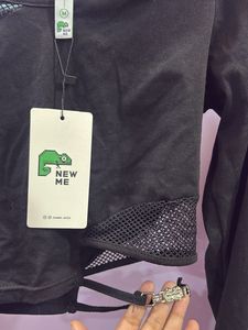 Newme Edgy Black Cutout Long Sleeve Top