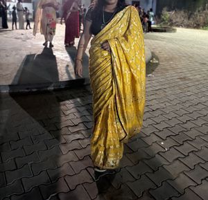 its good yellow color saree
