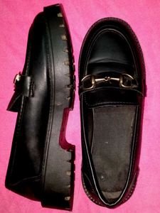Black Loafers with Gold Detail