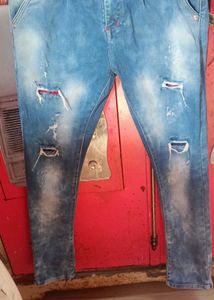 Distressed Blue Denim Jeans