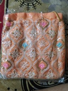 Embroidered Peach Potli Bag