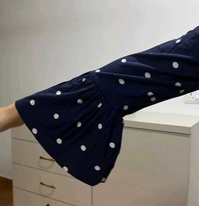 Chic Navy Blue Polka Dot Top with Bell Sleeves