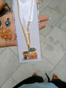 Necklace with chains and lockets