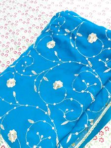 ✨ Teal Blue Saree with Golden Floral Elegance ✨
