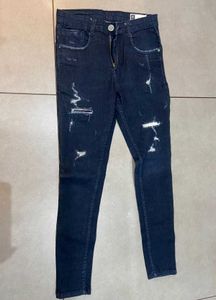 Distressed Denim Jeans