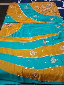 It Is Multi Color Chiffon Kundan Work Saree