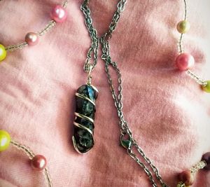 Rainbow Moonstone With major Inclusions Of Black Tourmaline 😍  PLEASE NOTE: You Get Only The Pendant and not the chain.