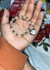 Pink Maple Leaf And Penguin Beaded Bracelet