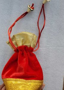 Price DropVelvet Red Wedding Potli With Golden Lac
