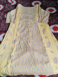 Beautiful Yellow Printed Kurti in Good Condition