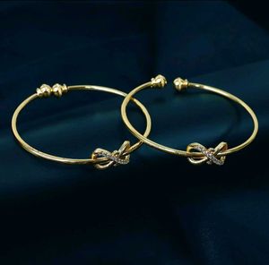 Gold Bow Bangle