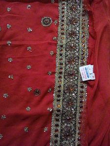 A Rust Colour Dress Material.
