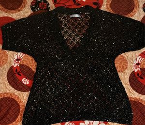 Black sheer top with little sequence work