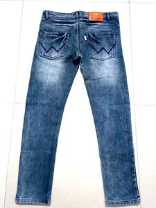 Ripped &amp; Distressed Slim Fit Jeans