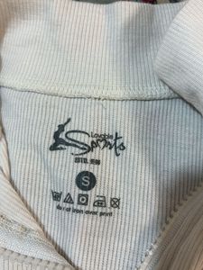 white full sleeved fitted crop top