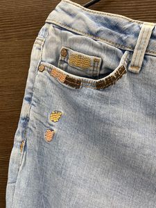 Ripped Light Wash Jeans