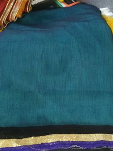 Elegant Teal and Gold Trim Saree