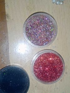 Elegant Jhumka Earrings and nail glitter