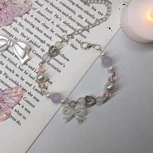 Cute Beaded Bracelet with Bow Charm