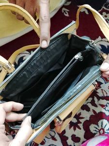 Elegant Handbag with Floral Detail