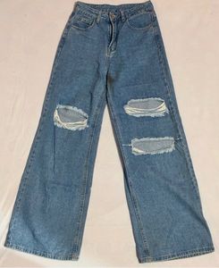 Women Ripped Wide Legged Jeans