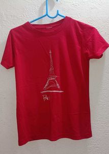 This is a pink coloured T-shirt