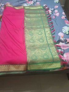 Elegant Pink Saree with Golden Details