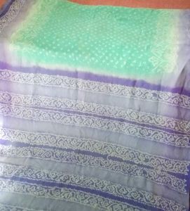 See green daily wear saree attached fall