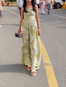 green and white floral printed jumpsuit