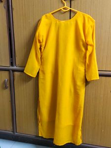 Limited Period Offer !!!Yellow Embroidered Kurti