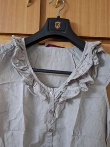 Ruffled Sleeveless Top
