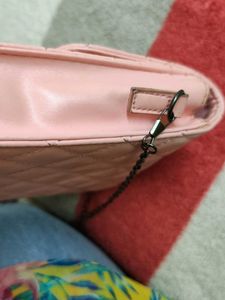 lino Perros pink sling bag