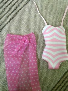 Pink &amp; White Striped Swimsuitand A Scirt.