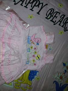 two baby girl dresses are there