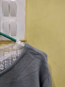 Chic Grey V-Neck Sweater with Delicate Lace Detail