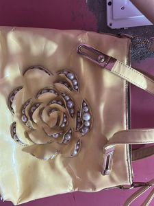 Floral pearl embellished purse