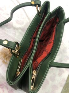 A Very Stylish Dark Green Handbag