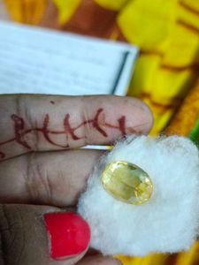 A yellow sapphire, also known as Pukhraj (पुखराज)