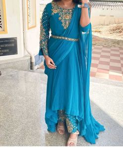Elegant Teal Indian Outfit with Gold Stone