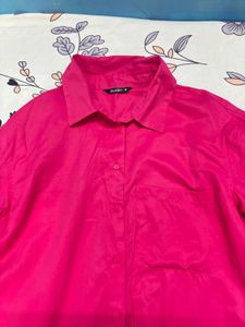 oversized pink shirt.