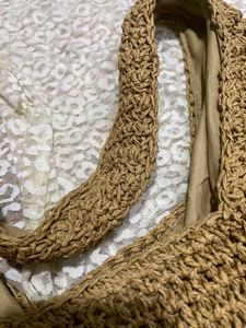 Woven straw shoulder bag