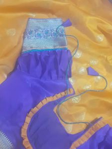 mango colour saree with ready stitched pattern blouse....